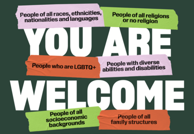 Poster with the words "You Are Welcome Here." displayed.