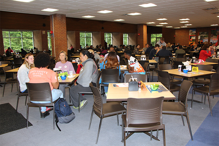 College students sitting together during Mix It Up at Lunch Day.
