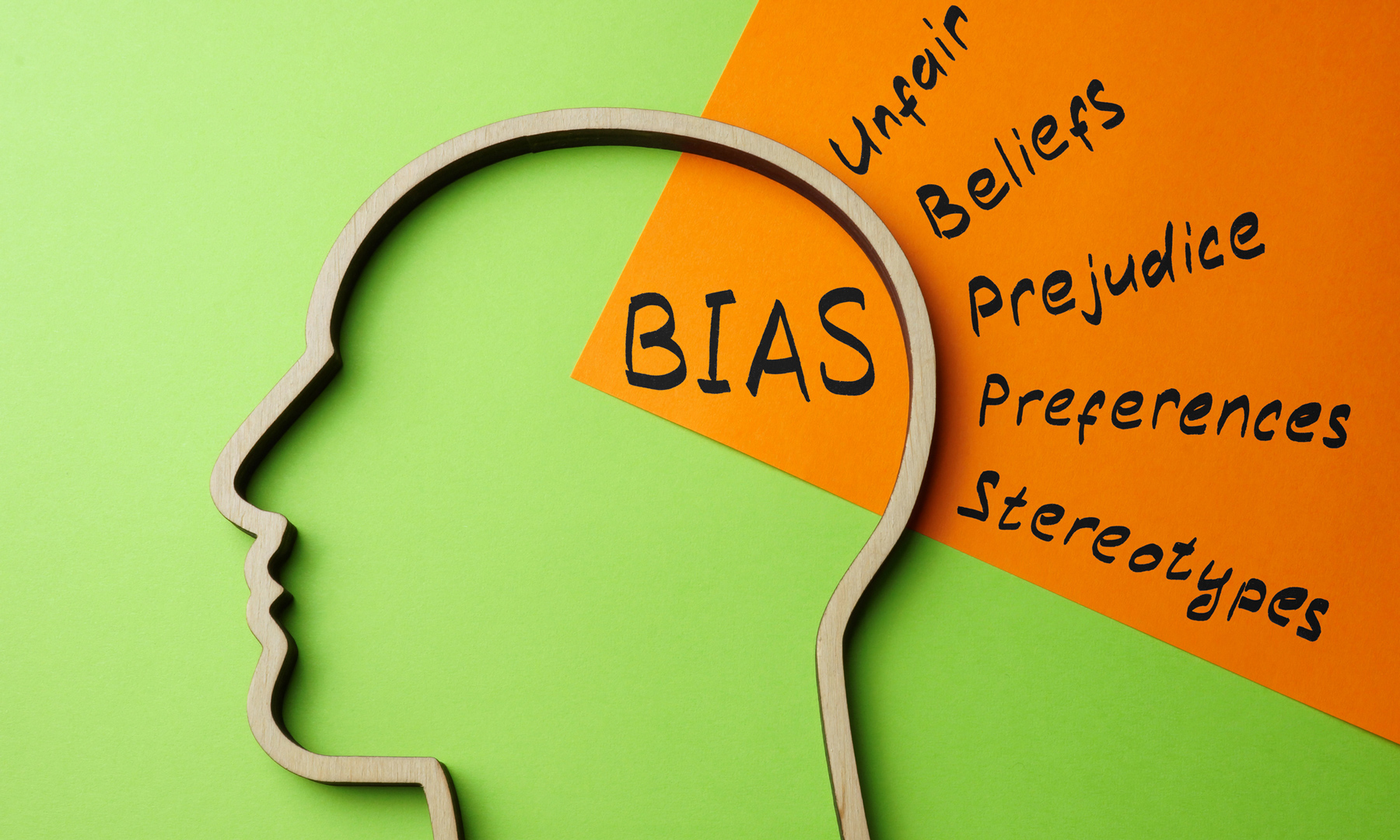 An illustration of a person's head with the word "bias" and related terms.