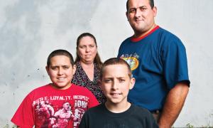 Irma Lucena and Carmelo Vega, with their sons, Mike Vega and Alex Vega.