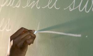 hand writing on chalk board
