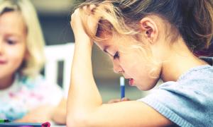 girl concentrating on school work