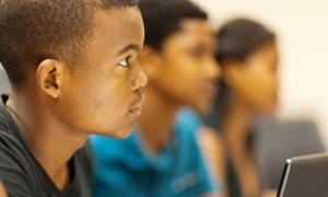 male student listening