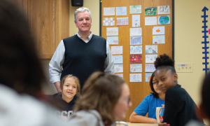 Chris Dolgos looking over his class of students.