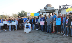 Students of St. Joseph High School gathered in front of burned Mosque in solidarity.