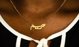 Photo of author Maryam Asenuga's necklace in Arabic