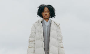 Photo of Black student in light jacket.