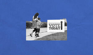 Mother and son walking along a rural road with Vote Today sign by the side.