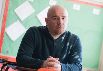 Present-day Jamie Nabozny sitting in a classroom