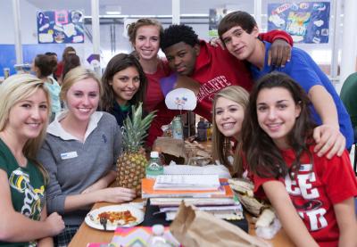 Mix It Up participants pose at a table