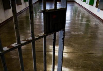 An open cell door at a prison