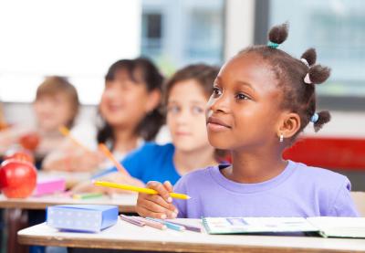 female student listening in class