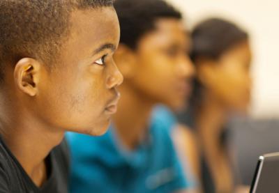 male student listening