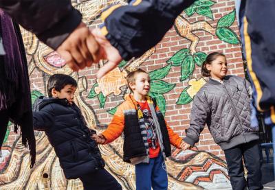 Teaching Tolerance children holding hands; partners