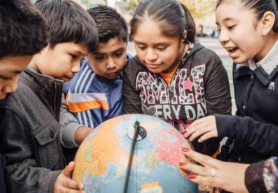 Teaching Tolerance students studying globe; student tasks