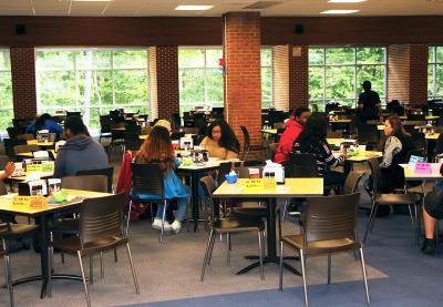 College students sitting together during Mix It Up at Lunch Day.