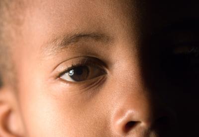 Close up of young African-American child.