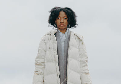 Photo of Black student in light jacket.