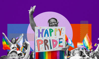 Pride Celebration with woman holding sign that reads Happy Pride