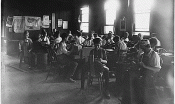 young children at work in an early 20th century factory