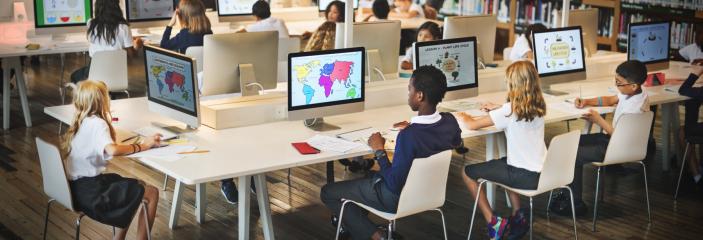 students in media center library