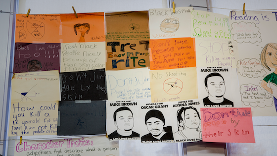 Student artwork and work on the wall of a classroom, centered on the topic of Black Lives Matter