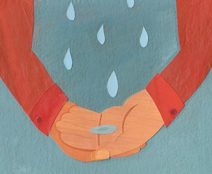 hands receiving rainwater