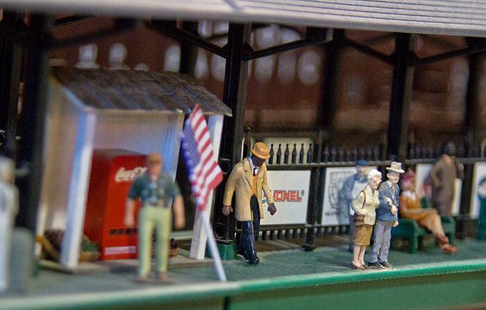 train exhibit figurines