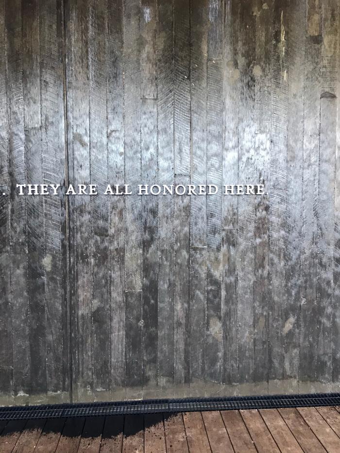 Wall that reads "They Are All Honored Here" at the Memorial for Peace and Justice 