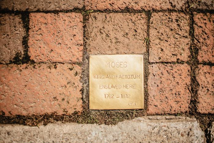 Witness Stone with the engraving "MOSES King and Factotum Enslaved Here 1762 - 1812."