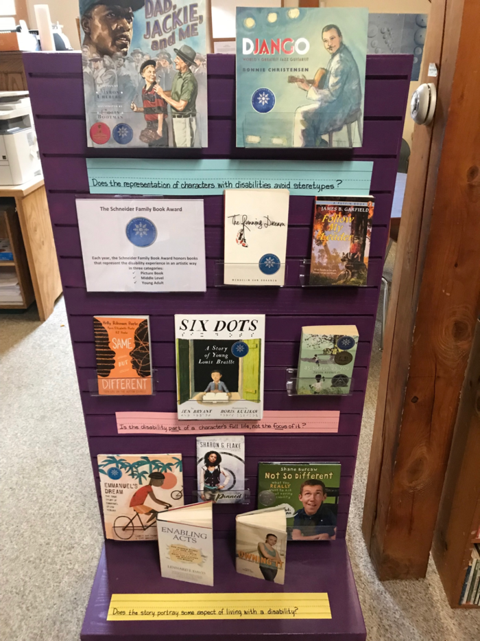 MapleStone School library book display about the Schneider Family Book Award