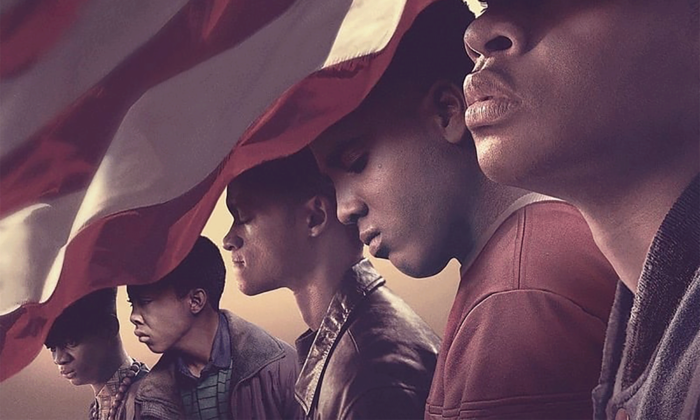 Cover image of the Netflix limited series 'When They See Us,' featuring five young men of color who are partially covered by the American flag.