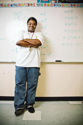 Lincoln Duane Johnson in front of his whiteboard