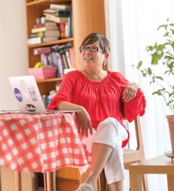 Miriam Santos-Amador sitting in her home